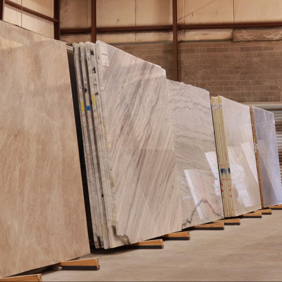 Row of stone slabs in a warehouse setting
